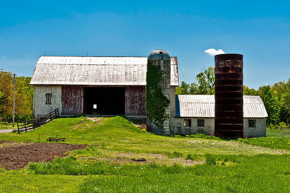 Barm with Window and Cloud Coming from Silo